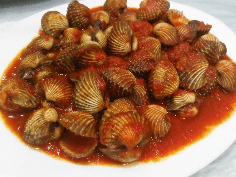 Kerang bumbu menjadi ciri khas unik dengan rasa sedap dan lezat